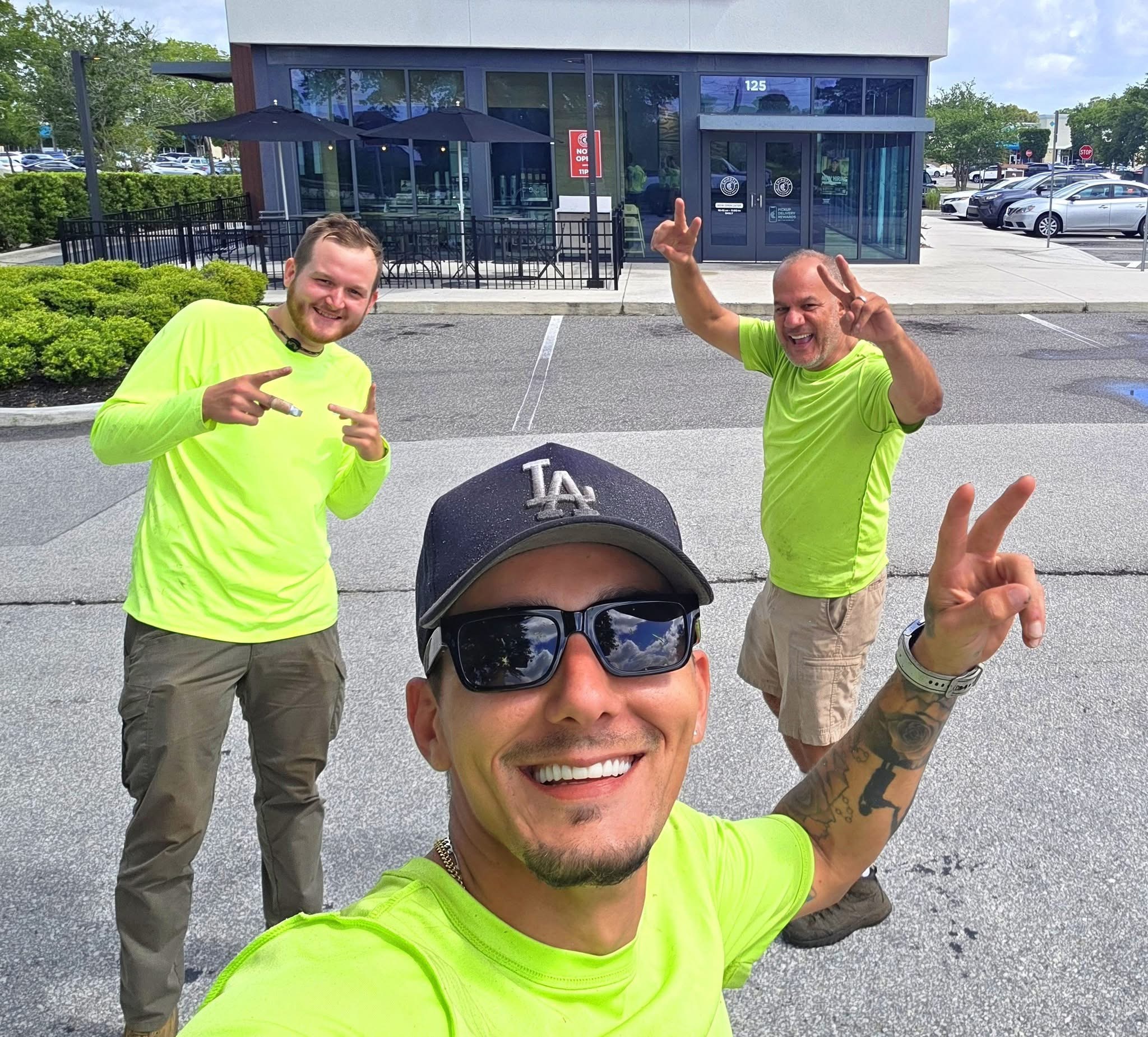 The Hurricane Lawn Service team — Christian, Josh, and Jose